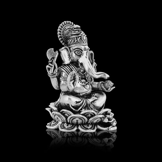 Silver Idol Ganesh siting w/o Prabhavali