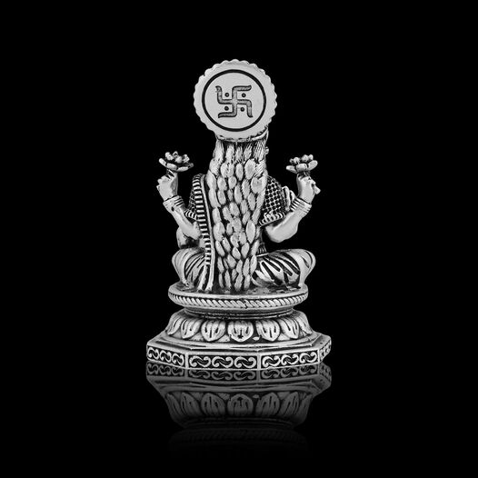 Idol Lakshmi sitting w/o Prabhavali