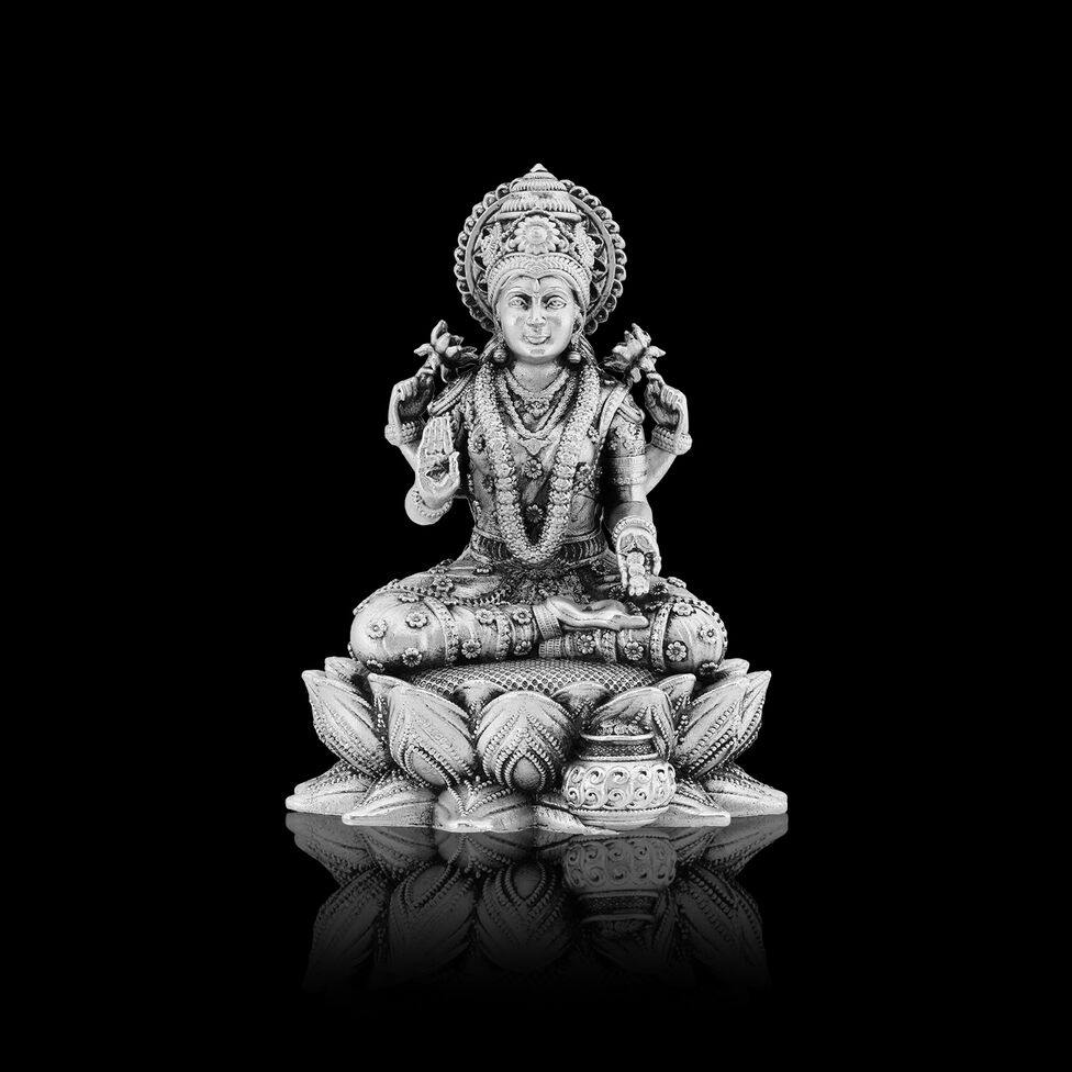Idol Lakshmi sitting w/o Prabhavali