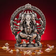 Silver Idol Ganesh siting with Prabavali