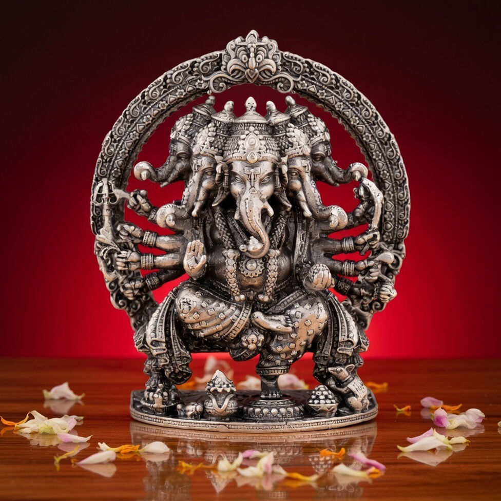 Silver Idol Ganesh siting with Prabavali