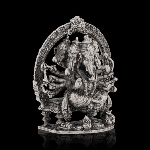 Silver Idol Ganesh siting with Prabavali