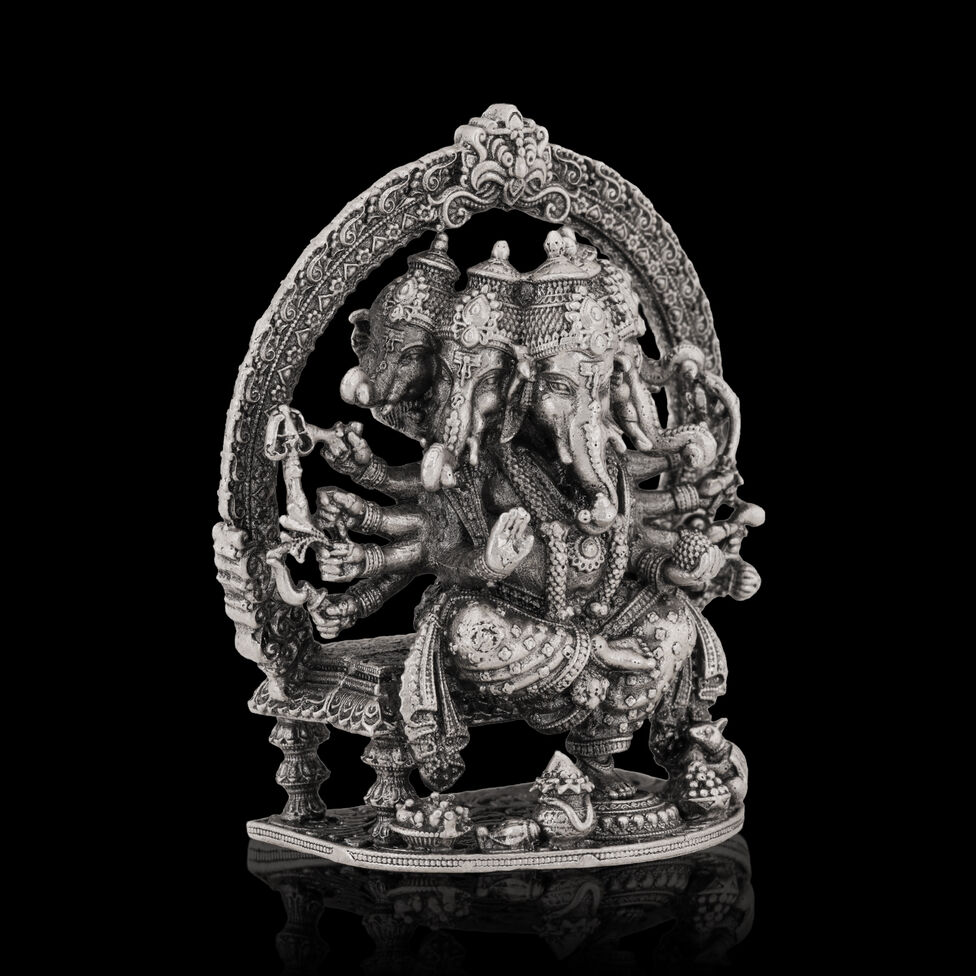 Silver Idol Ganesh siting with Prabavali