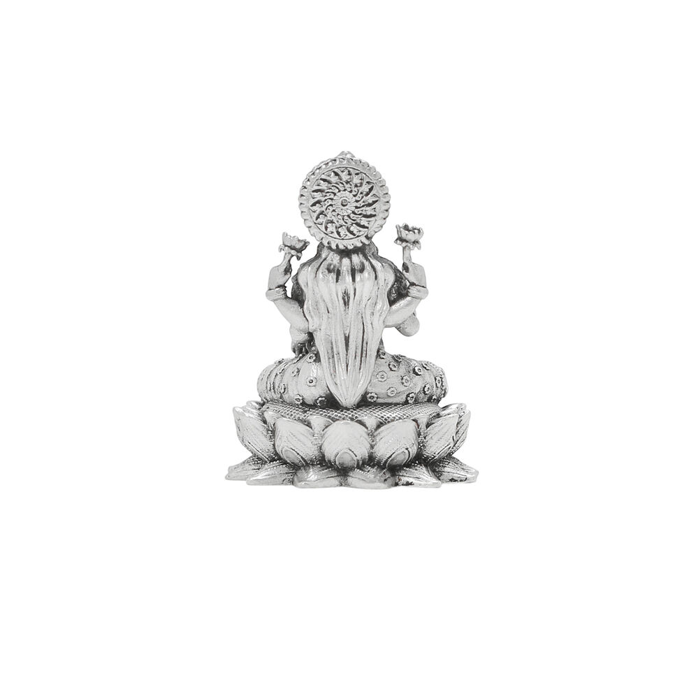 Idol Lakshmi sitting w/o Prabhavali