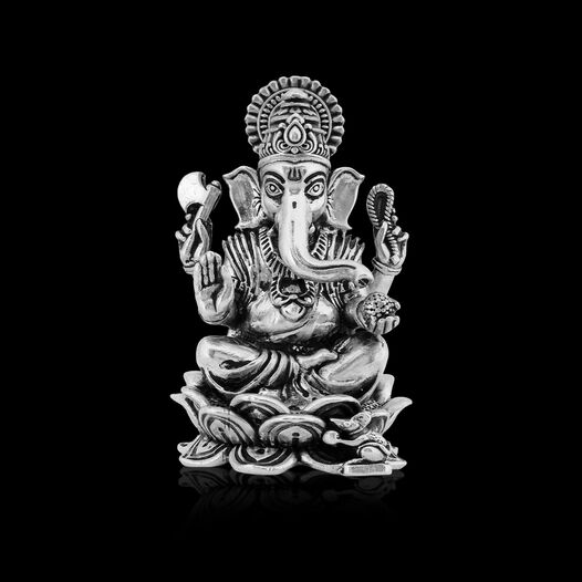 Silver Idol Ganesh siting w/o Prabhavali