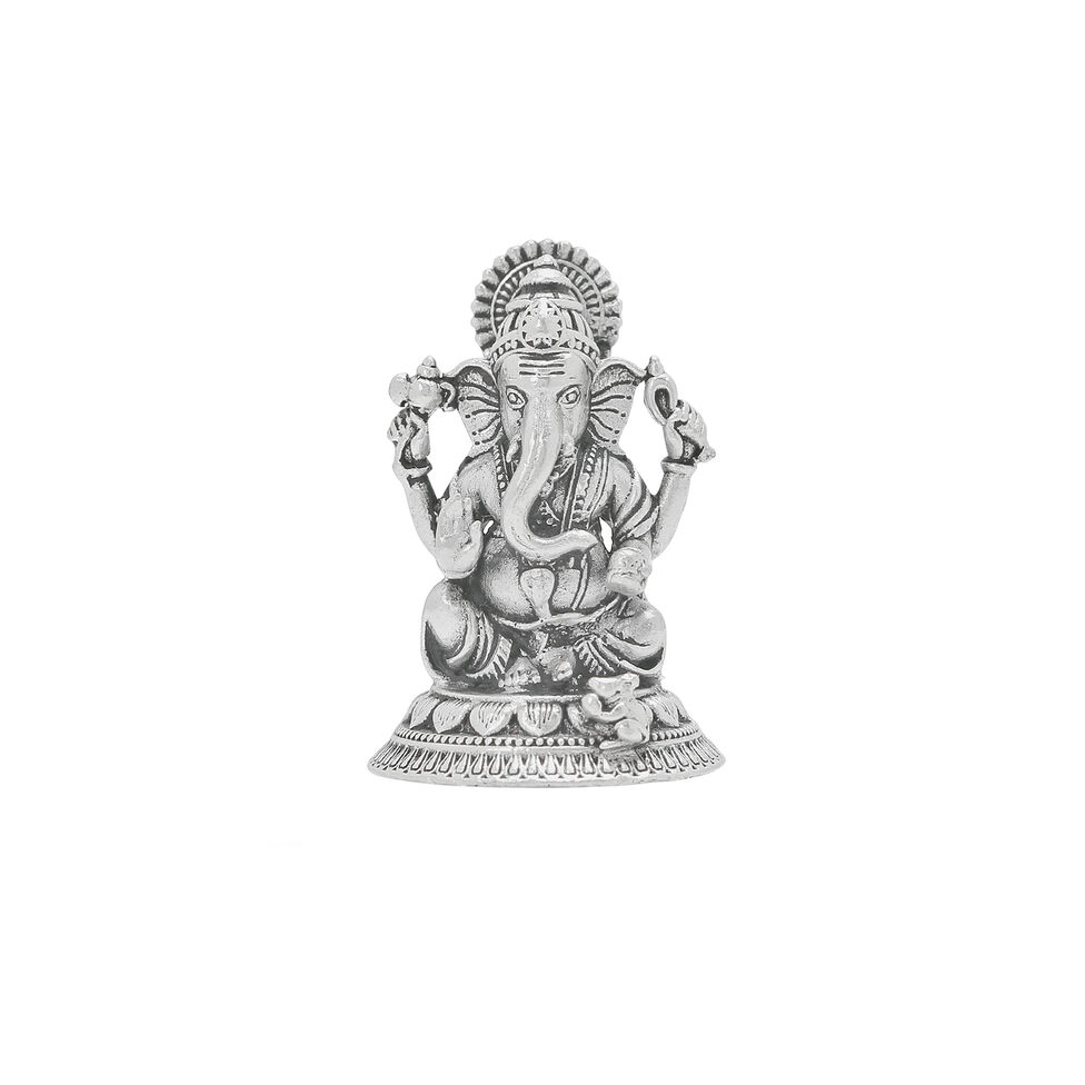 Silver Idol Ganesh siting w/o Prabhavali