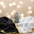Silver Idol Ganesh siting w/o Prabhavali
