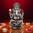 Silver Idol Ganesh siting w/o Prabhavali