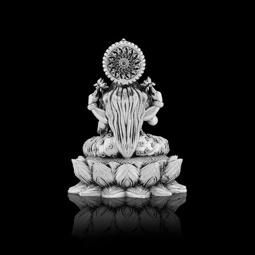 Idol Lakshmi sitting w/o Prabhavali