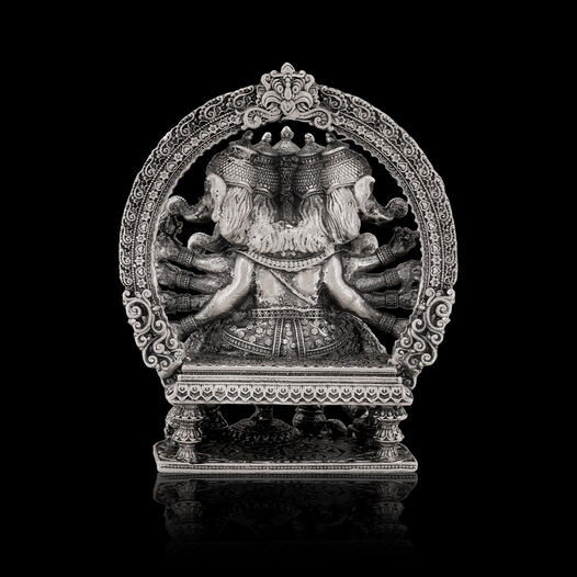 Silver Idol Ganesh siting with Prabavali
