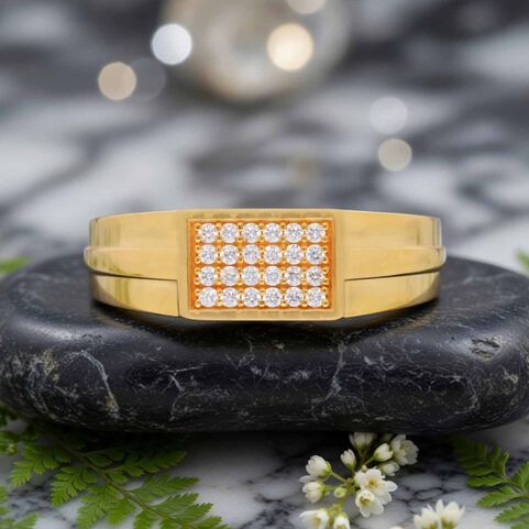 GEMSET GOLD GENTS RING IN CASTING