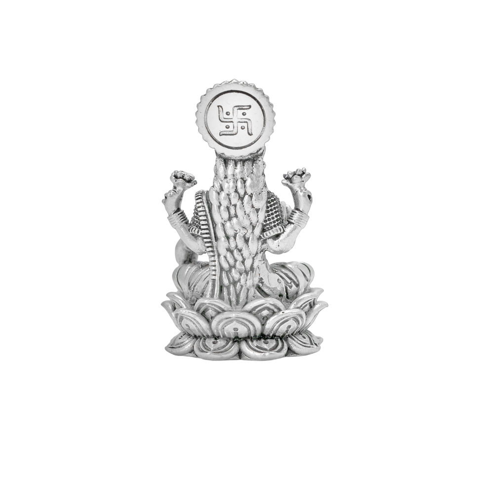 Idol Lakshmi sitting w/o Prabhavali