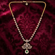 Diamond Neckalce in Fancy Patt with Gem