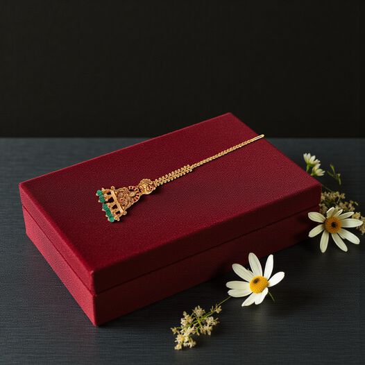 GOLD HEAD ORNAMENT/TEEKA IN REPOUSSEWORK