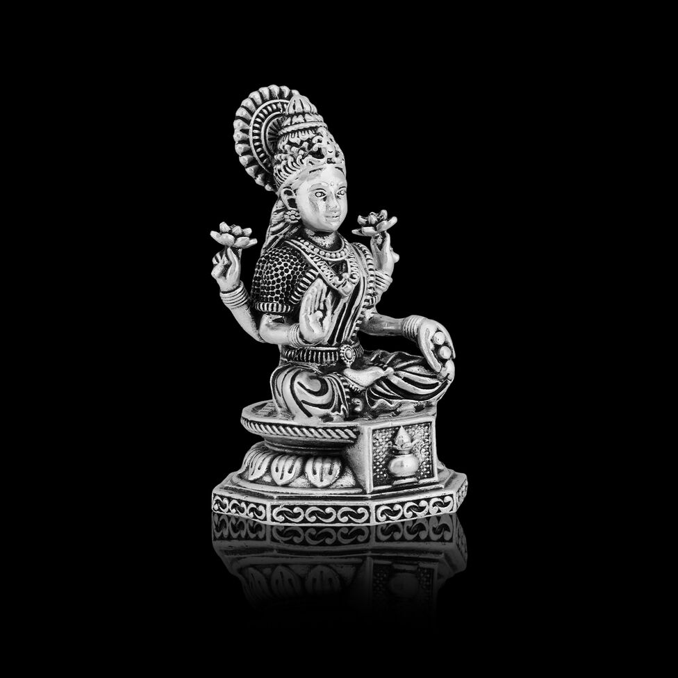 Idol Lakshmi sitting w/o Prabhavali