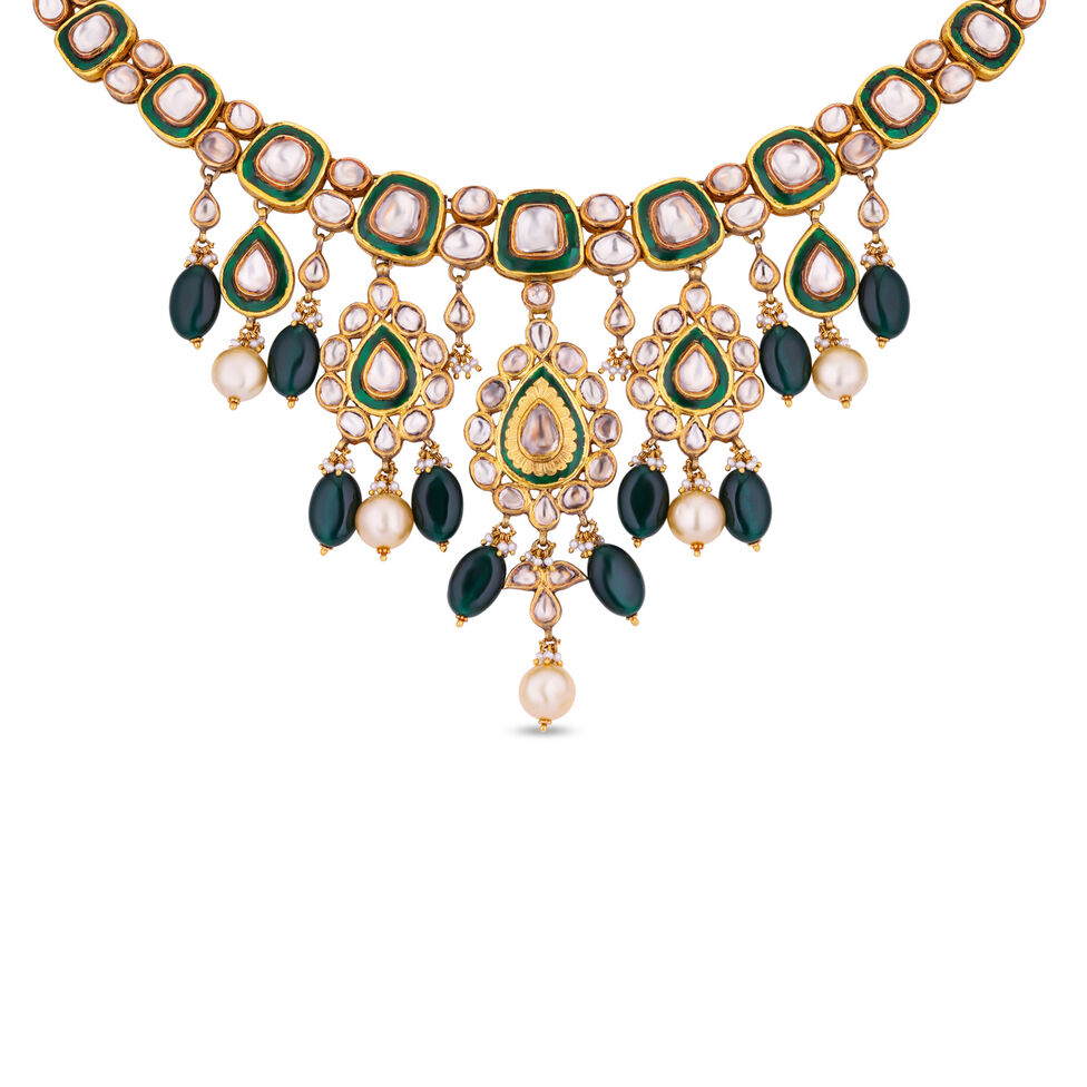 GOLD NECKLACE IN KUNDALAVELAI DESIGN