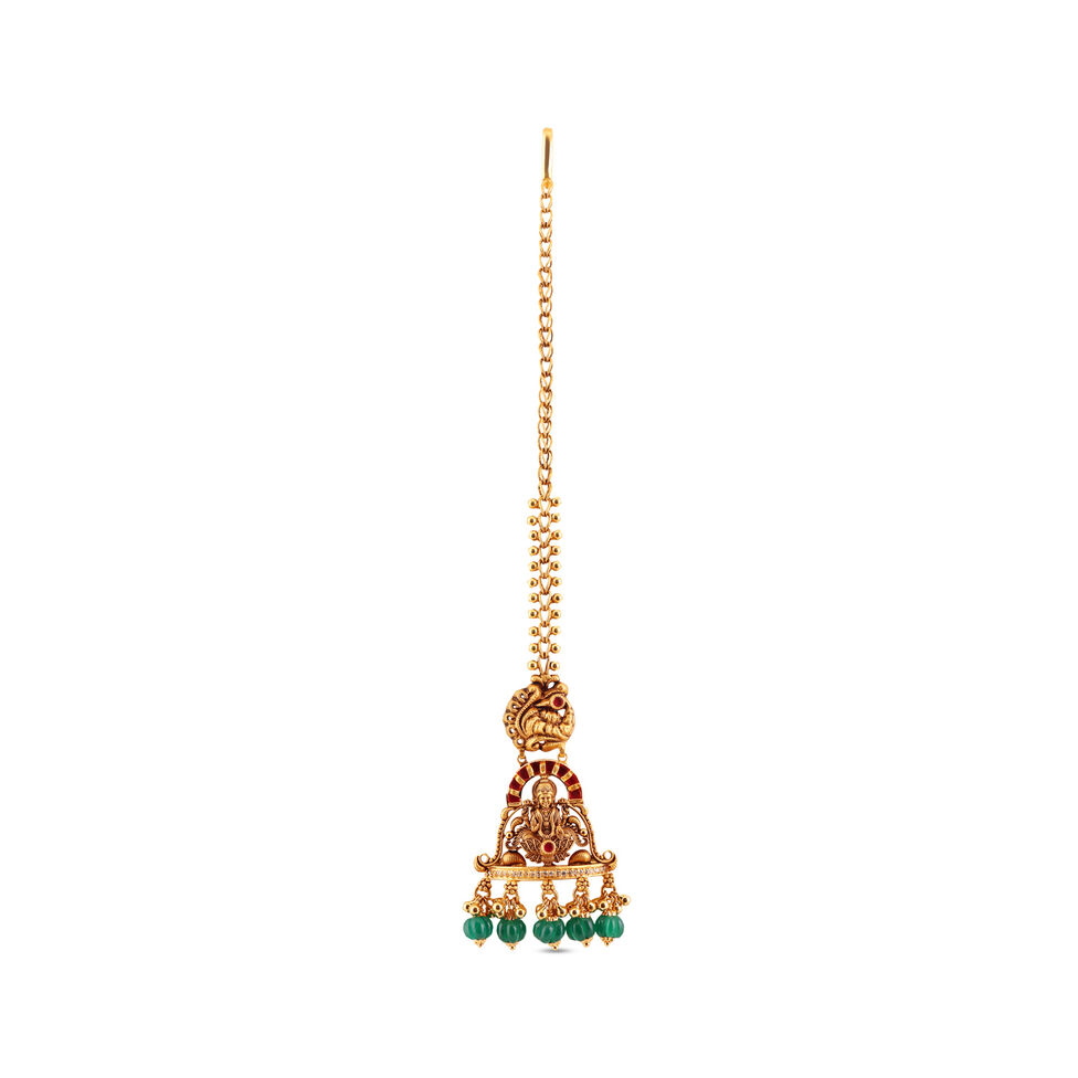 GOLD HEAD ORNAMENT/TEEKA IN REPOUSSEWORK